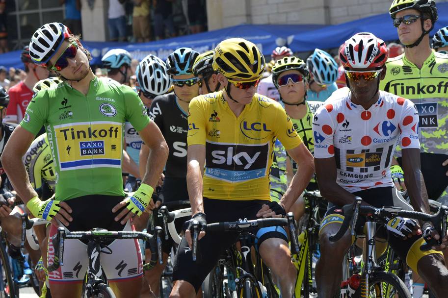 Tre maglie; Sagan in verde, Froome in giallo, Teklehaimanot a pois. Afp